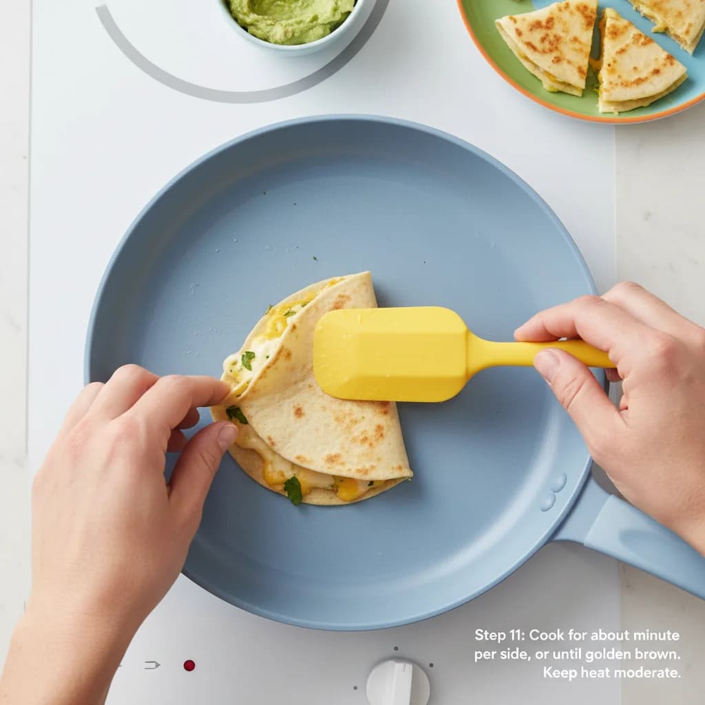 Step 11: Cook for about 1 minute per side, or until the tortilla is lightly golden brown and the cheese is me for Egg-cellent Cheesy Quesadilla Bites